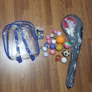 Clear bag full of balls toys paddles games marbles